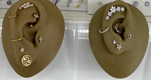 Explore red hand tattoo ideas, creative tattoo ideas in Amarillo, available at Sunflower Body Jewelry