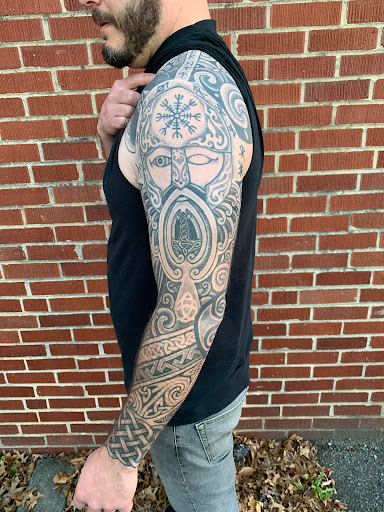 Find cute cat tattoo ideas for your next unique tattoo in Strasburg at Champion Tattoo Company