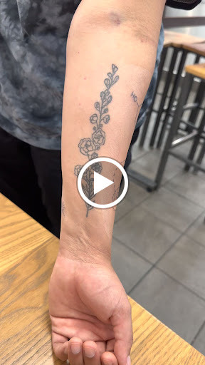 Explore ear tattoo ideas for females, creative tattoo ideas in San Diego, available at Family Business Tattoo San Diego