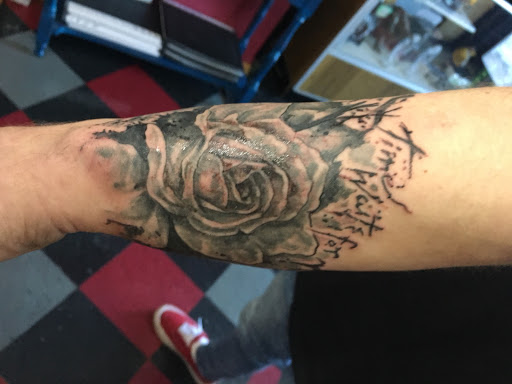 Explore dog tattoos ideas, creative tattoo ideas in Green Bay, available at Darkside Tattoo By Jesse Skywalker