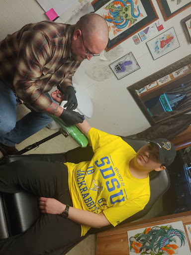 Explore forearm tattoo name ideas, creative tattoo ideas in Sioux Falls, available at Outlaw Tattoos