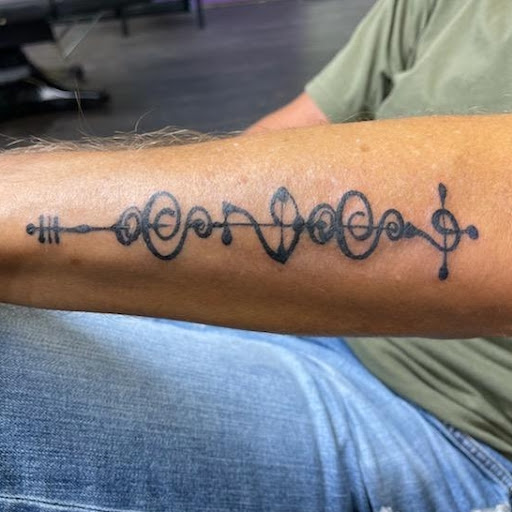 Explore mens rib tattoo ideas, creative tattoo ideas in Mckinney, available at Borrowed Time Fine Art Gallery Tattoo Shop