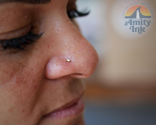 Explore hood tattoo ideas for men, creative tattoo ideas in Toledo, available at Piercings by Caitlin presents Holier Toledo