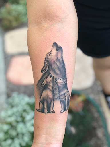 Explore twin daughter tattoo ideas, creative tattoo ideas in Anaheim, available at Autumn Moon Tattoo