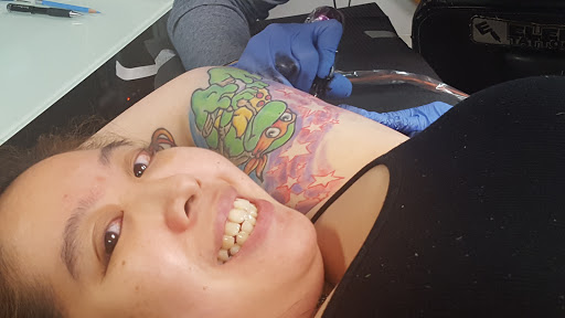 Tattoo Shop «Funky Rooster Tattoo and Art Gallery», reviews and photos, 73 S Grove Ave, Elgin, IL 60120, USA