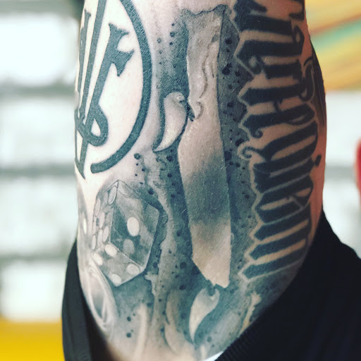 Explore two face tattoo ideas, creative tattoo ideas in Fayetteville, available at American Tattoo Society of Fayetteville