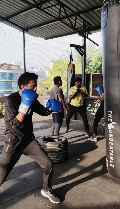 Surat Boxing Club (Red-X) - Red-X Gym, Mahadev chowk, Maruti Nandan Society, Mota Varachha, Surat, Gujarat 394101, India