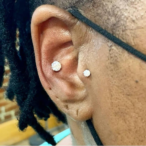 Explore half sleeve tattoo ideas for guys, creative tattoo ideas in Charleston, available at Exotic Impressions Body Piercing