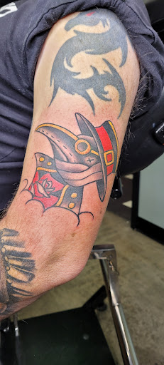 Explore massage therapist tattoo ideas, creative tattoo ideas in Paducah, available at Knuckle Up Tattoo Co.