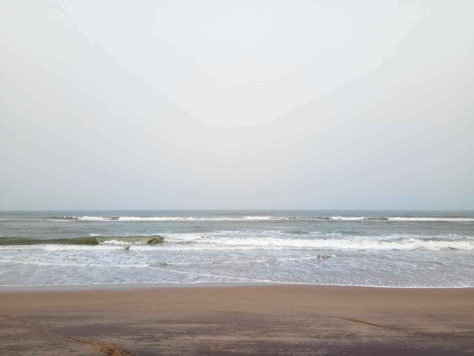 Valokuva Rajaram Puram Beachista. - suosittu paikka rentoutumisen tuntijoille