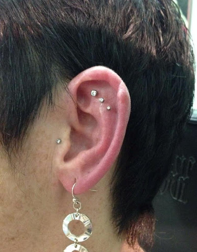 Explore dominican republic tattoo ideas, creative tattoo ideas in Green Bay, available at Colourbox Body Piercing Llc