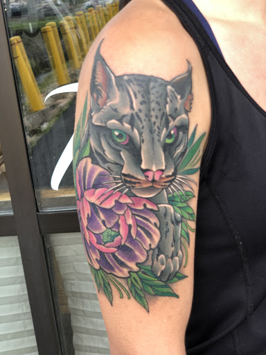 Explore lupus awareness tattoo ideas, creative tattoo ideas in Erie, available at Wayward Tattoo Studio