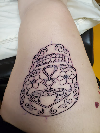 Explore world traveler tattoo ideas, creative tattoo ideas in Ottawa, available at Audacious Ink Tattoo Studio