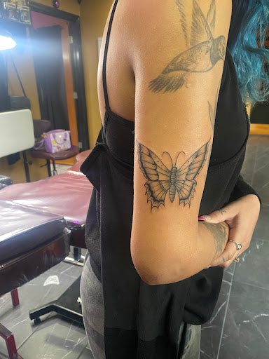 Explore leg tattoo ideas woman, creative tattoo ideas in Titusville, available at Exclusive Ink Studio