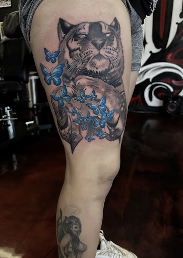 Explore sunflower and butterfly tattoo ideas, creative tattoo ideas in Silver City, available at Independent Ink Tattoo