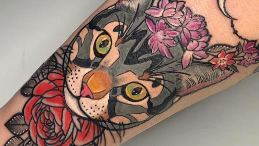 Explore loyalty over love tattoo ideas, creative tattoo ideas in Saint Louis, available at Steel and Ink Tattoo Studio