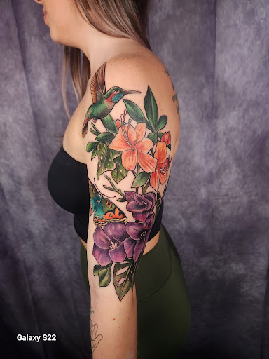 Explore name neck tattoo ideas, creative tattoo ideas in Buford, available at Inked Arts Tattoo Studio