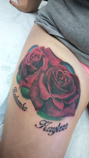 Explore cute cross tattoo ideas, creative tattoo ideas in Bradenton, available at Sacred Arts Tattoo Bradenton