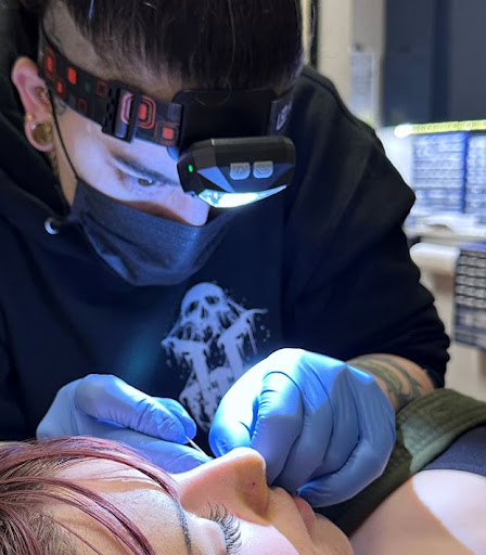 Explore black and white voodoo/ragdoll broken heart tattoo ideas, creative tattoo ideas in Vancouver, available at Hopeless Tattoo & Piercing