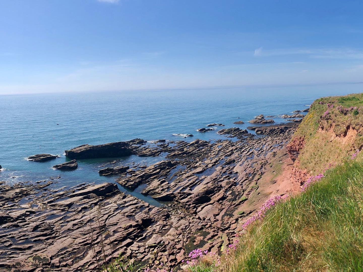 Valokuva Seaton Cliffs Beachista. puhtaustasolla korkea