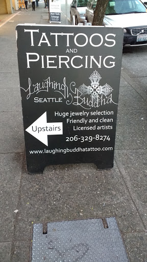 Explore curious george tattoo ideas, creative tattoo ideas in Seattle, available at Laughing Buddha Seattle