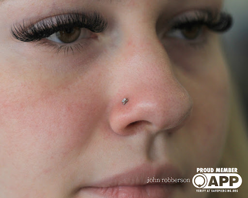 Explore dirt bike tattoos ideas, creative tattoo ideas in Fort Myers, available at Tiger Lotus Tattoo and Piercing