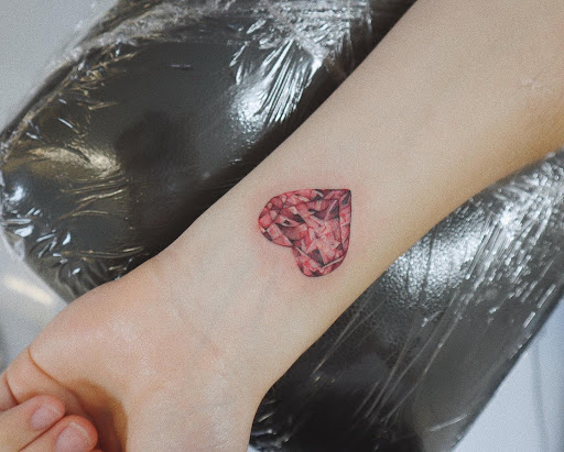 Explore cross cover up tattoo ideas, creative tattoo ideas in Orange, available at Baron Art Tattoo