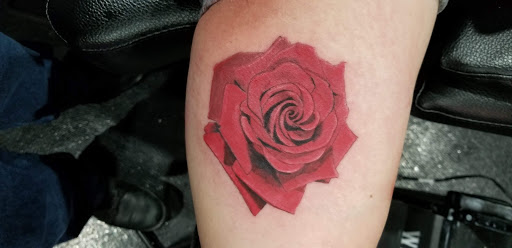 Explore flower tattoo sleeve ideas, creative tattoo ideas in Kenosha, available at Kenosha Tattoo Company