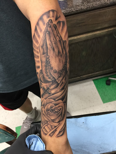 Explore half sleeve skull tattoo ideas, creative tattoo ideas in Lawton, available at Impact Ink Tattoo Studios