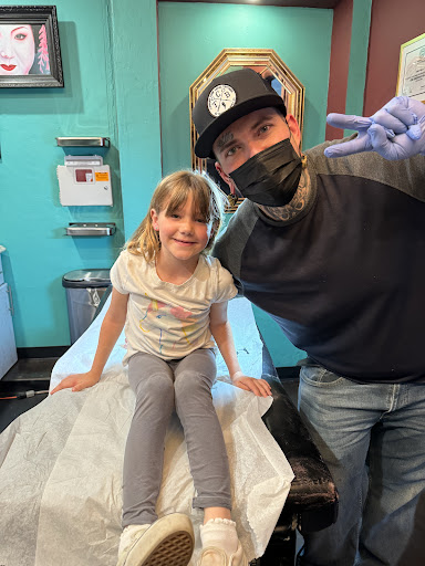 Explore cross cover up tattoo ideas, creative tattoo ideas in San Diego, available at Sideshow Tattoo and Piercing