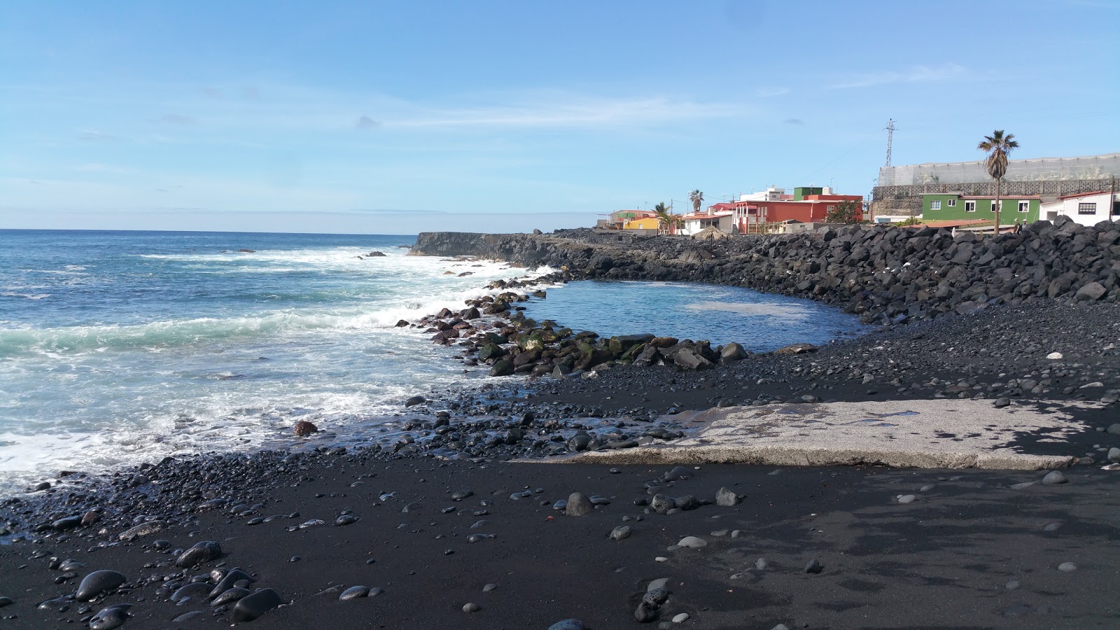 Foto af Playa El Remo med blåt rent vand overflade