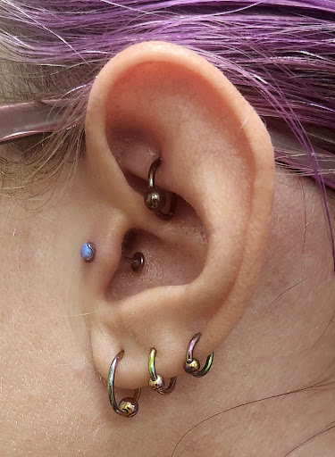 Explore sunset tattoo ideas, creative tattoo ideas in Hampton, available at Blue Horseshoe Tattoo and Body Piercing