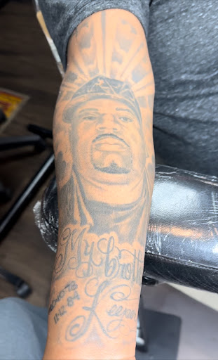 Explore roman numerals tattoo idea, creative tattoo ideas in Lake Charles, available at Brand-X Tattoo & Piercing