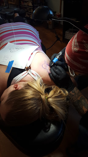 Tattoo Shop «The Shop», reviews and photos, 141 S Grand Ave, Fowlerville, MI 48836, USA