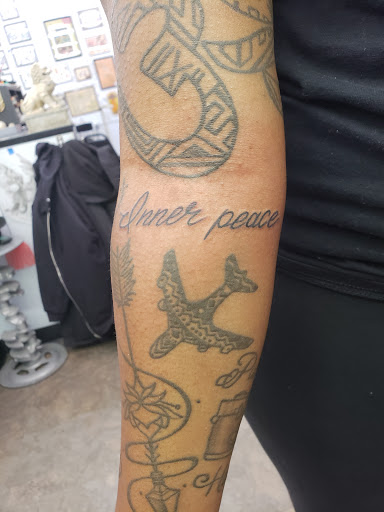 Explore son and daughter tattoo ideas, creative tattoo ideas in Minneapolis, available at Scottish Rose Tattoo