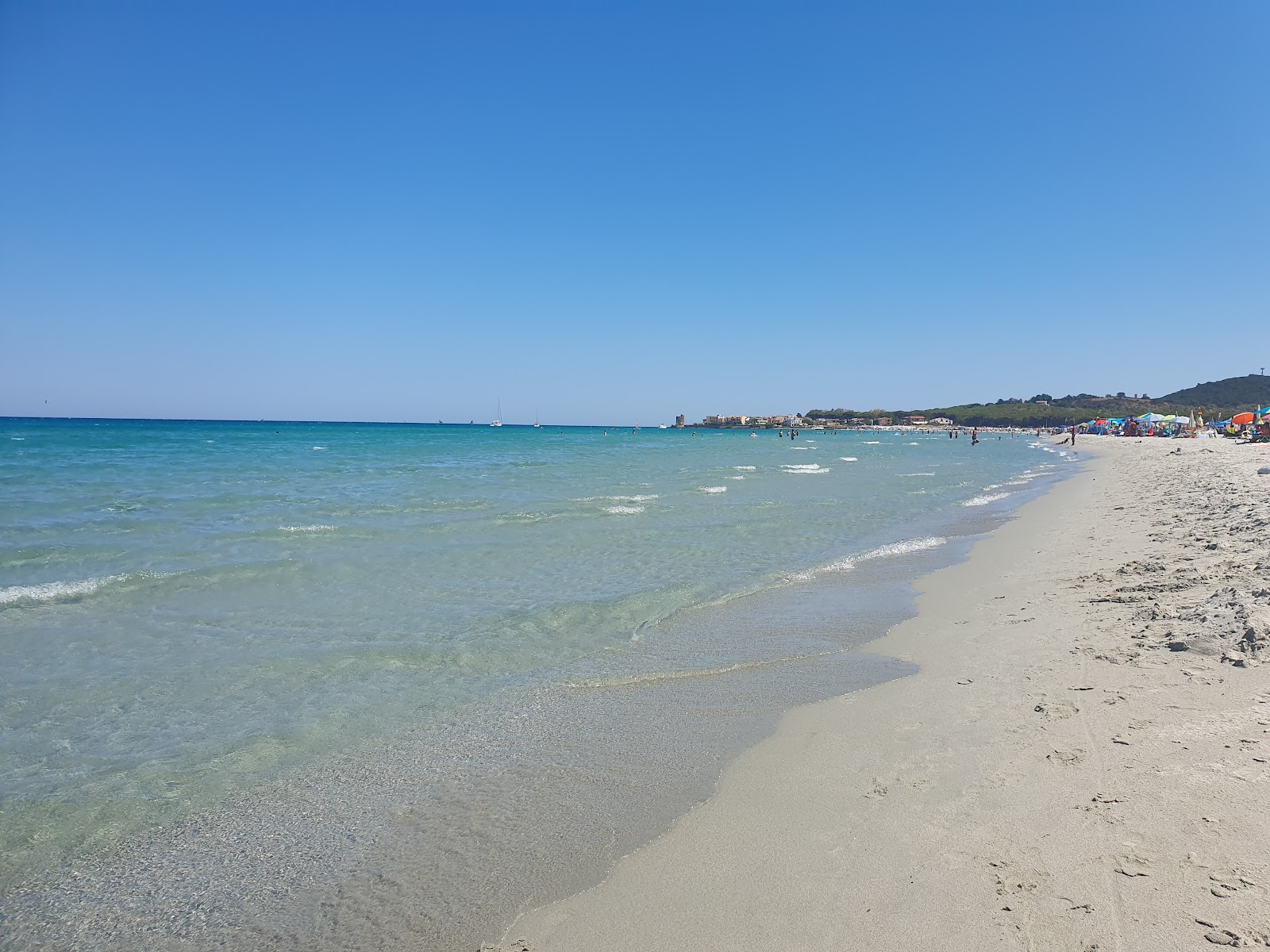 Fotografija Spiaggia di Santa Lucia z dolga ravna obala