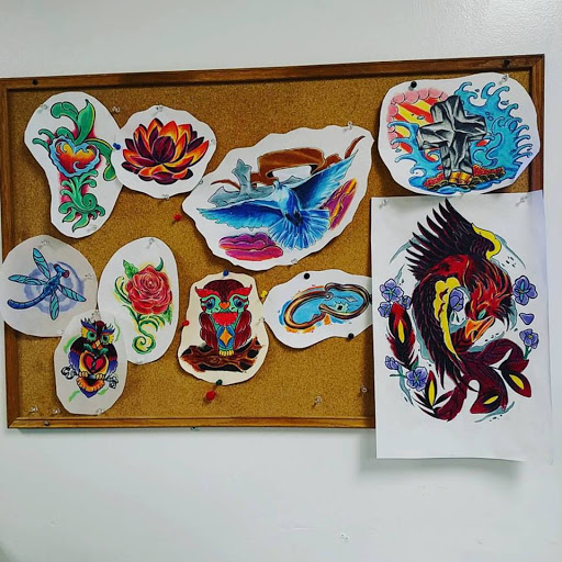 Explore simple motorcycle tattoo ideas, creative tattoo ideas in Augusta, available at Excalibur Art Collective