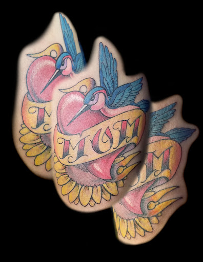 Explore tattoo cover up ideas for upper back, creative tattoo ideas in Albuquerque, available at A Touch of Ink Tattoo & Art Gallery