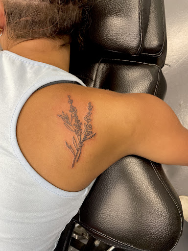 Explore fine line name tattoo ideas, creative tattoo ideas in Meridian, available at Creative Pain Tattoo Studio