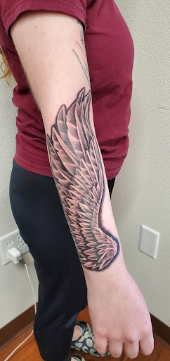 Explore watercolor tattoo ideas for females, creative tattoo ideas in West Fargo, available at Avenue Tattoo