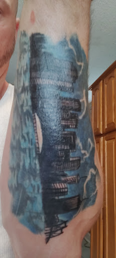 Explore lily flower tattoo ideas, creative tattoo ideas in New Orleans, available at Mid City Voodoux Tattoos