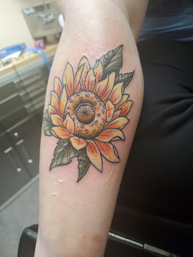 Explore dumb tattoo ideas, creative tattoo ideas in Madison, available at Blue Lotus Tattoo & The Piercing Lounge