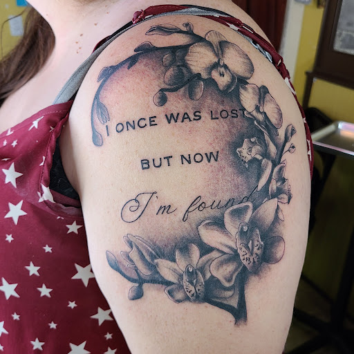 Explore deadpool tattoo ideas, creative tattoo ideas in Seymour, available at Popseys Electric Tattooing Co.