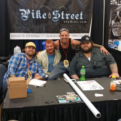 Explore saturn tattoo ideas, creative tattoo ideas in Bridgeport, available at Pike Street Studios Tattoo and Body Piercing