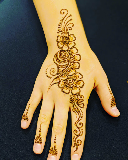 Explore tattoo ideas for single moms, creative tattoo ideas in Concord, available at Naseera Fazil Henna Art