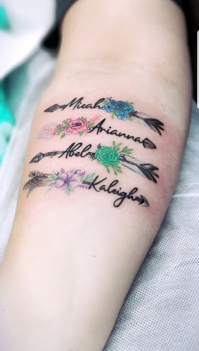 Explore tattoo ideas for name cover up, creative tattoo ideas in Benton, available at Spectrum Tattoo