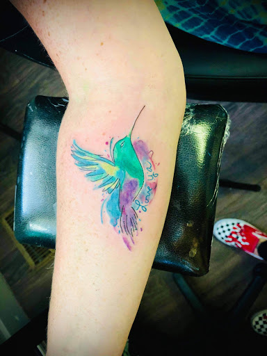 Explore leo tattoo ideas for women, creative tattoo ideas in Warrensburg, available at Altered Visions Tattoo Studio