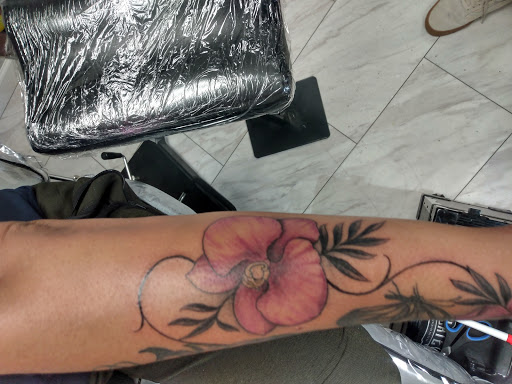 Explore tattoo ideas daisy, creative tattoo ideas in Oak Grove, available at Empire28 Tattoo Studios