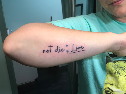 Explore love symbol tattoo ideas, creative tattoo ideas in Meridian, available at Creative Pain Tattoo Studio