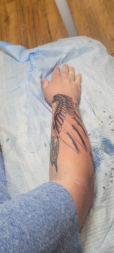 Explore santa tattoo ideas, creative tattoo ideas in Redding, available at Caddy Daddys